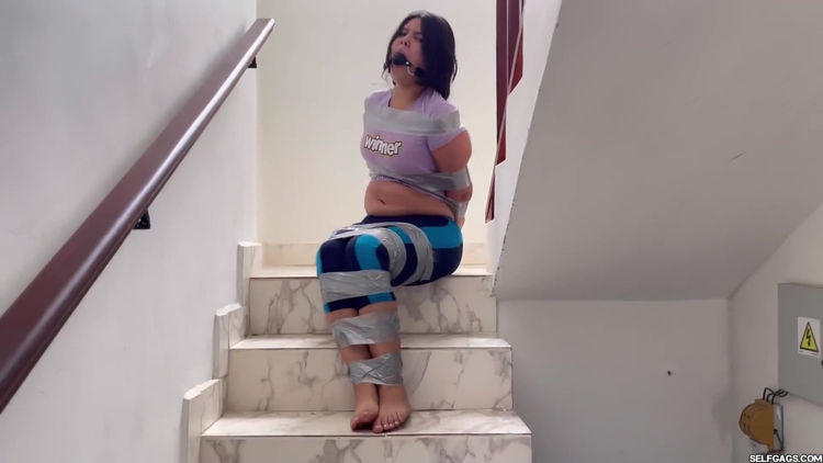 Ball Gagged Girl Struggle In Tape Bondage_main_thumbnail